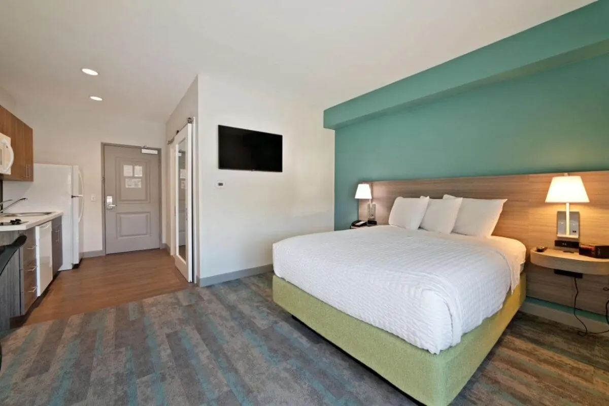 Extended stay hotel room with pet-friendly policy